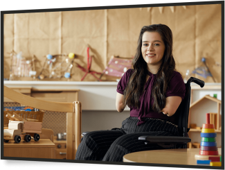 Young woman in wheelchair working in nursery